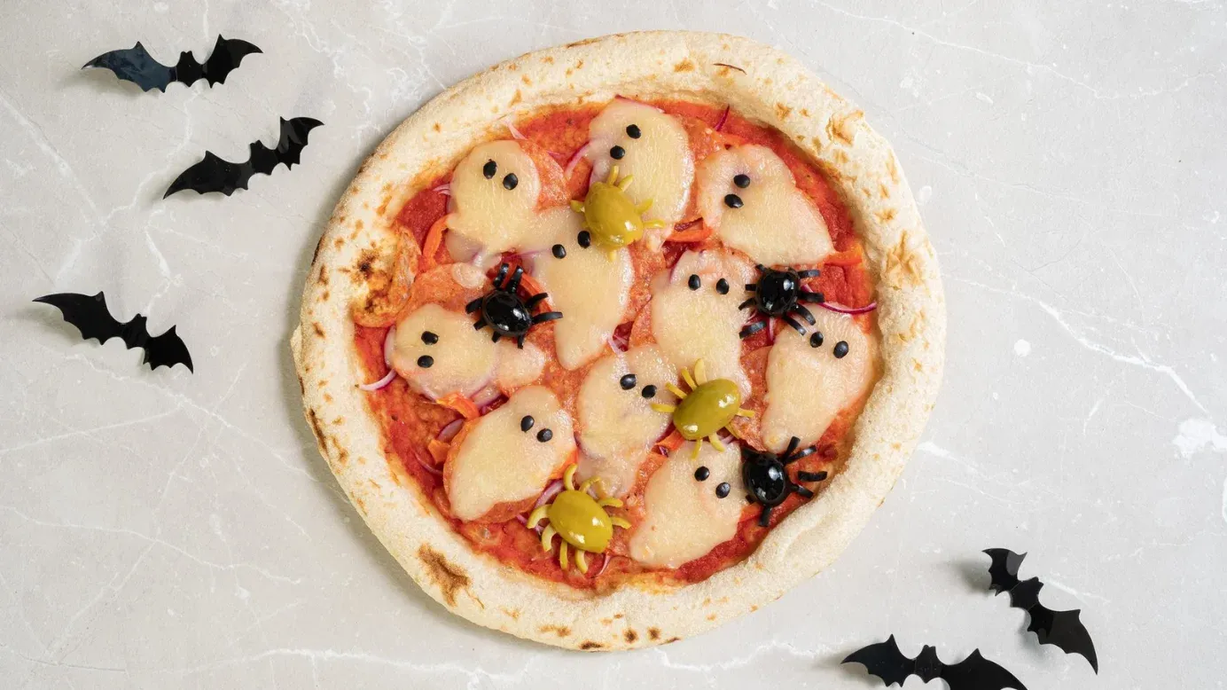 Spooky spiderweb pizza