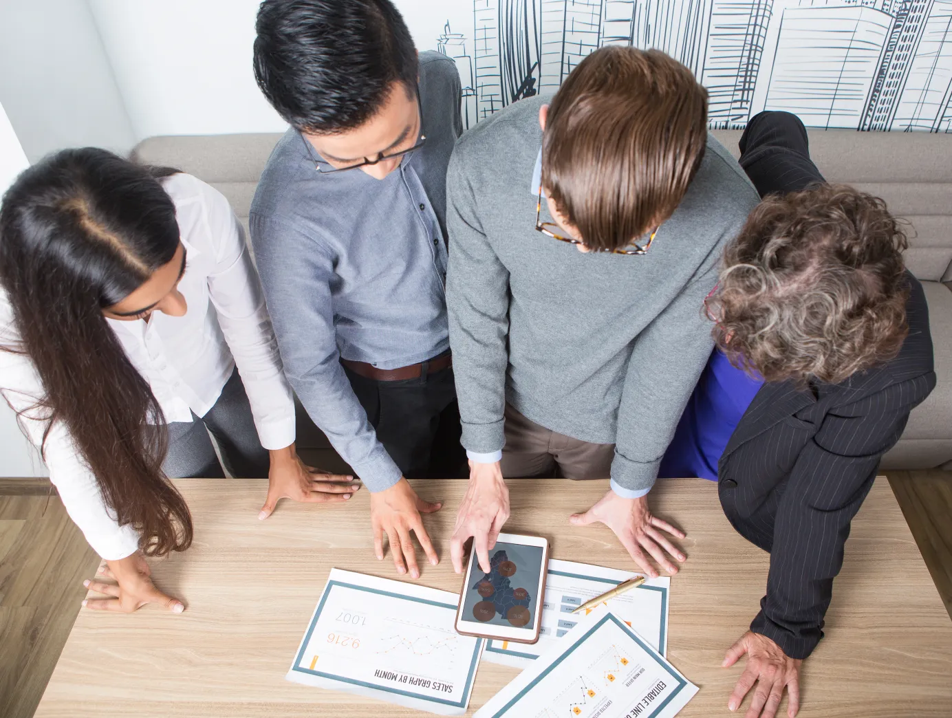 Four Colleagues sharing feedback